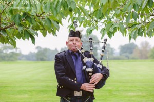 bagpiper at Cowdray house